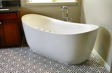 Residential plumbing photo of standalone bathtub
